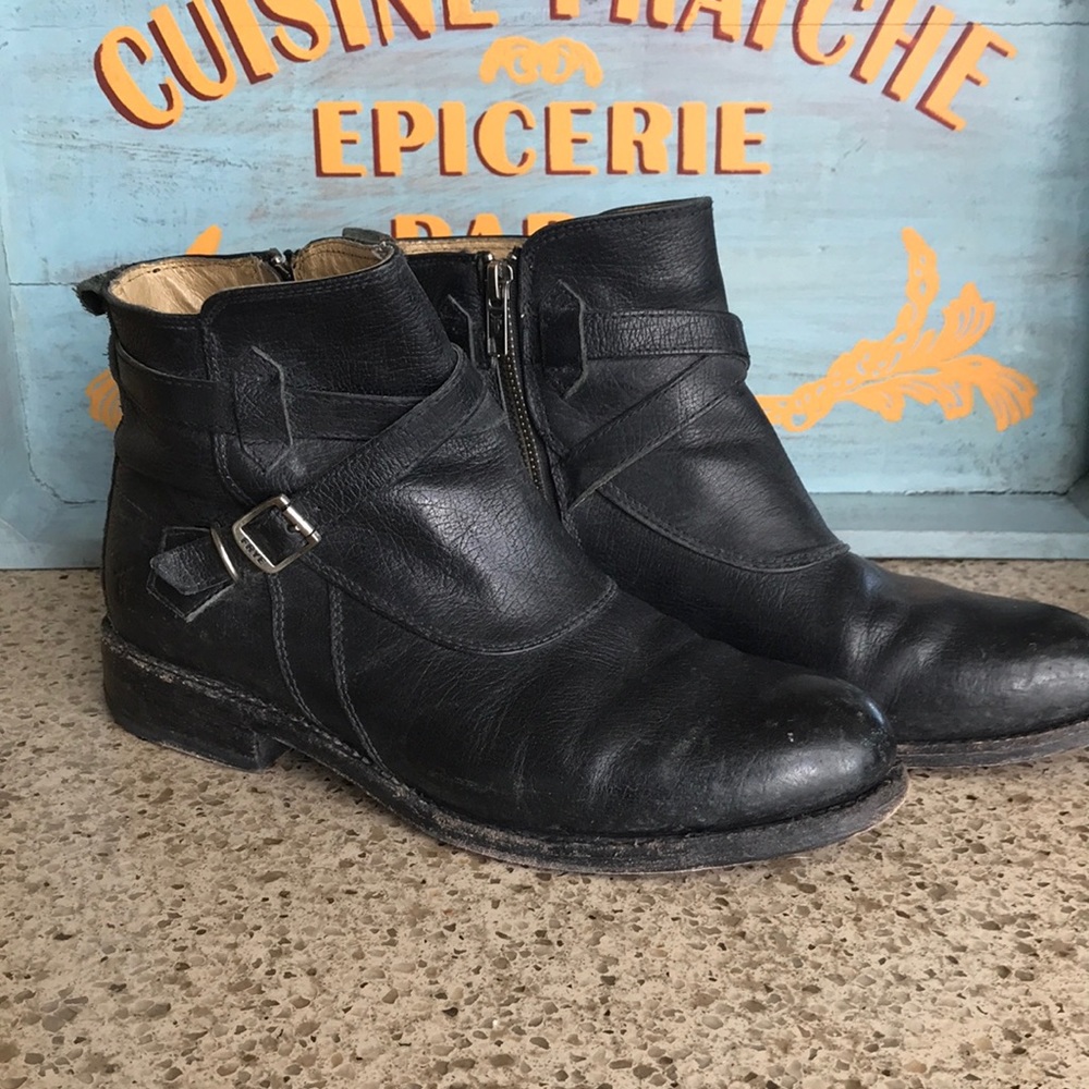 Frye distressed booties in black leather.